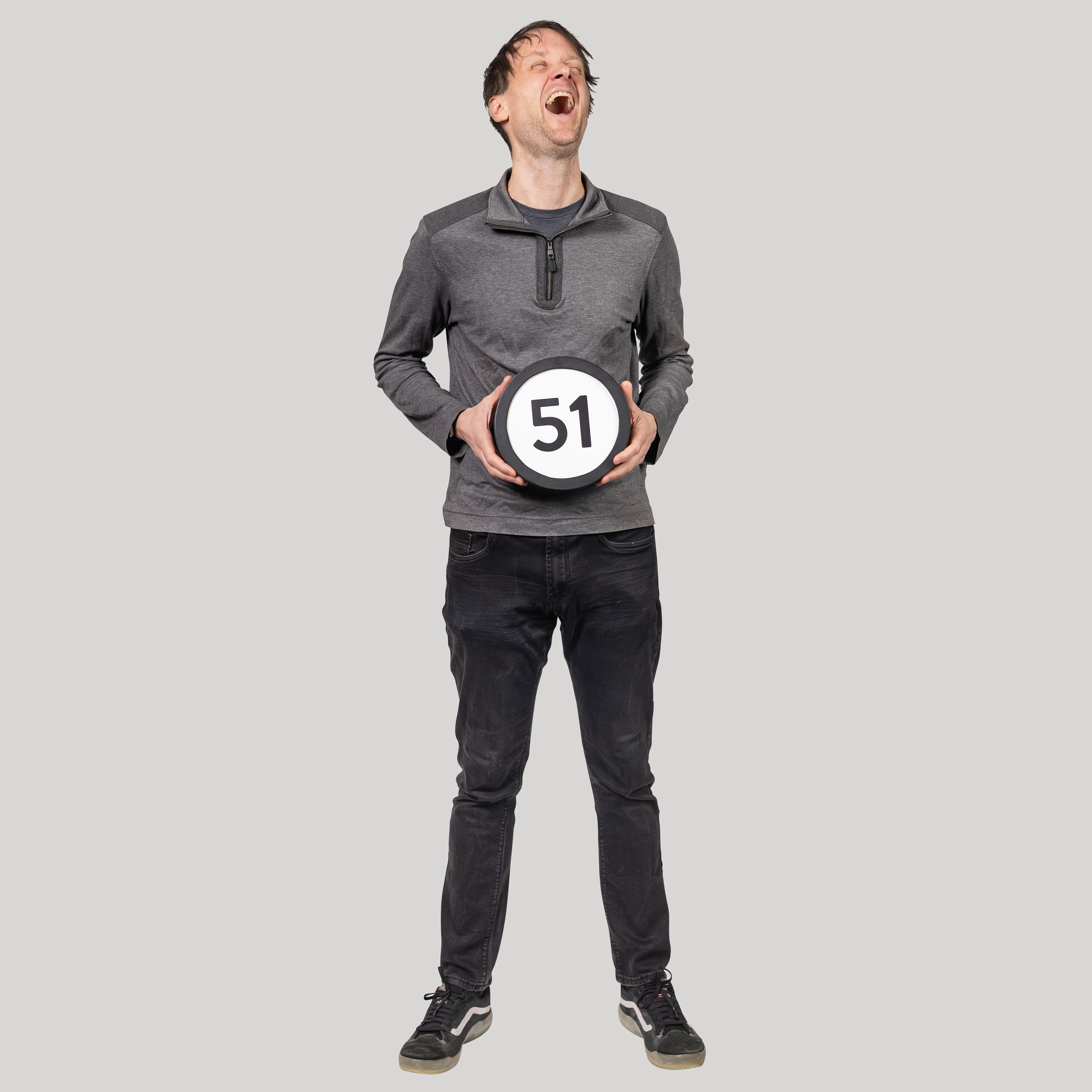 51-year-old man holds the number 51 in the 1 to Infinity, MIT portrait series by Danny Goldfield.
